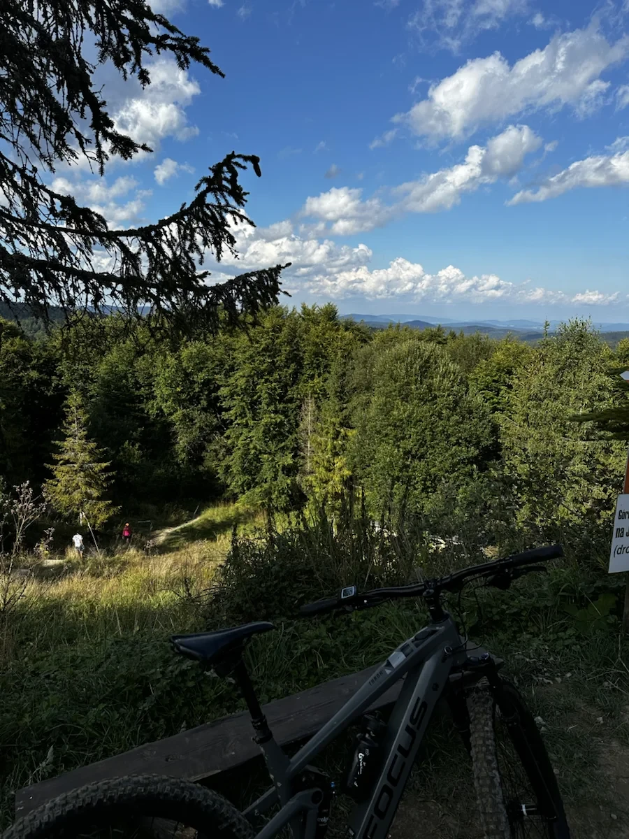 A loaded bicycle overlooking a mountain valley in Poland